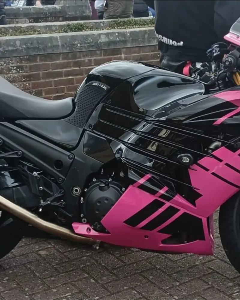Pink and black Kawasaki ZX-14R with freshly painted parts